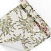 Rossi mistletoe-themed wrapping paper with festive green and white holly designs, perfect for holiday gift wrapping.