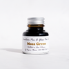 Papier Plume moss green fountain pen ink in a glass bottle, showcasing rich green ink for writing and artistic use.