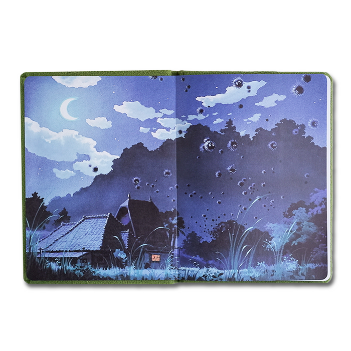 My Neighbor Totoro journal by Chronicle Books featuring Totoro and forest scene on a soft cover for writing and note-taking.
