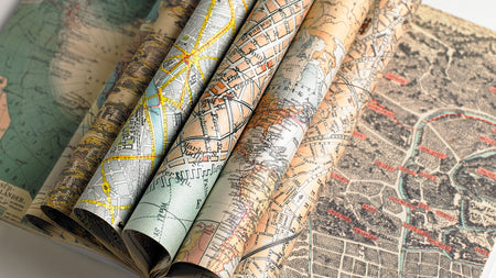 Pepin Press creative paper featuring colorful map designs, ideal for art, crafts, or decorative projects.