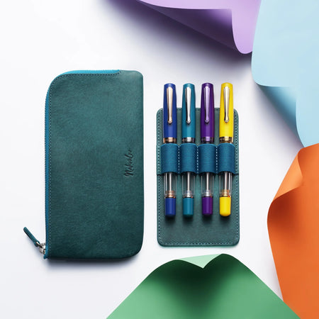 Nahvalur Original PLUS aquamarine fountain pen with silver accents, showcasing its sleek design and smooth writing tip.