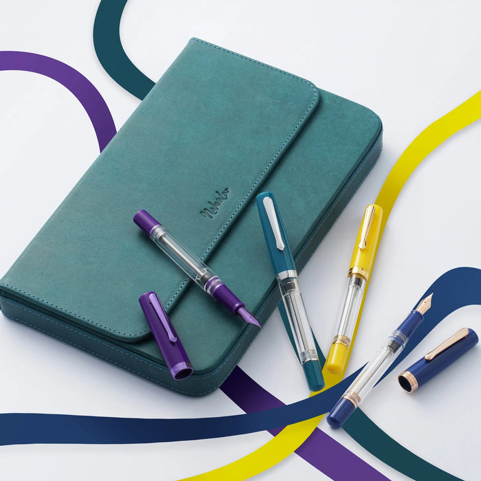 Nahvalur Original PLUS aquamarine fountain pen with silver accents, showcasing smooth barrel and elegant nib design.