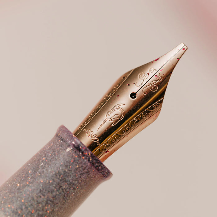Nahvalur Original PLUS fountain pen with Lovina graphite and Matira quartz accents, showcasing a sleek, elegant design.