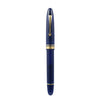 Omas Ogiva Blu fountain pen with sleek blue barrel and gold accents, close-up of the pen's tip and clip design.