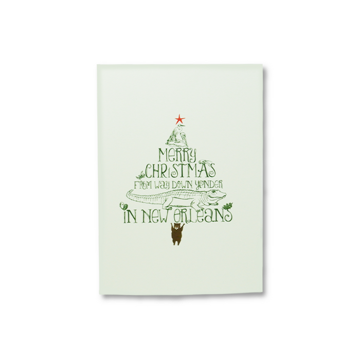 New Orleans Christmas-themed Scriptura Christmas card featuring festive holiday imagery and New Orleans cityscape design.