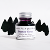Papier Plume fountain pen ink bottle in Oyster Grey, showcasing the ink's smooth flow and elegant packaging.
