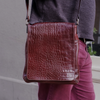 Munari Vachetta Cocco Leather Shoulder Bag with adjustable strap and sleek design, showcasing premium craftsmanship and natural leather finish.