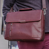 Black Orna Munari Smart briefcase bag with top handles and sleek design, suitable for professional and business use.