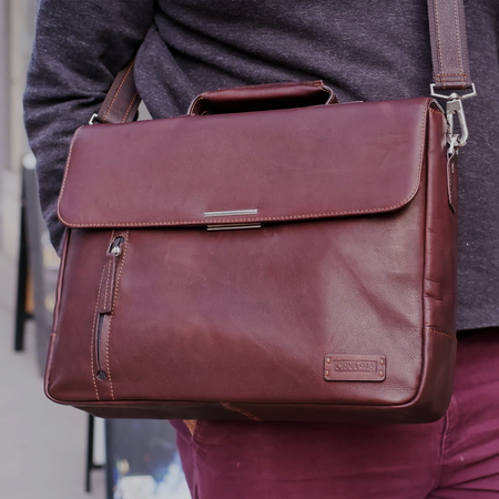 Black Orna Munari Smart briefcase bag with top handles and sleek design, suitable for professional and business use.