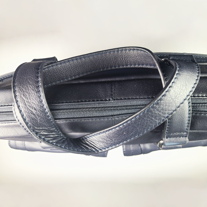 Orna blue briefcase with sleek design and sturdy handles, suitable for professional use and daily business needs.