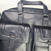 Orna blue briefcase with sleek leather design, featuring handles and silver hardware, suitable for professional use.