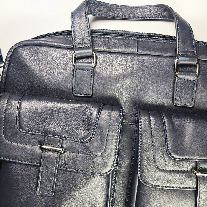 Orna blue briefcase with sleek leather design, featuring handles and silver hardware, suitable for professional use.