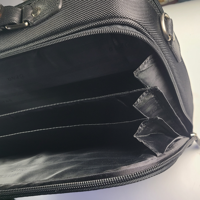 Black Orna 791 briefcase computer bag with sleek design and sturdy handle, ideal for professional work and travel.