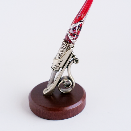 Bortoletti calligraphy pen rest with ornate design, crafted to hold calligraphy pens securely on a desk or workspace.