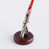 Bortoletti calligraphy pen rest in ceramic, designed to hold a calligraphy pen securely on a desk or workspace.