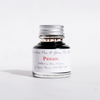 Papier Plume fountain pen ink in Pecan color, featuring a glass ink bottle with a black cap and gold label for writing and calligraphy.