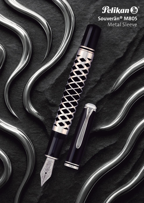 Pelikan Souverän M805 fountain pen with a sleek metal sleeve, featuring a black body and gold accents.