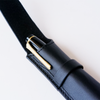 Black leather pen case by Eng Leather Co. with a single slot, designed for elegant storage of a single pen or writing instrument.
