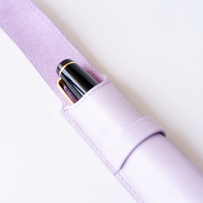 Purple leather pen case by Eng Leather Co. with a single slot for storing a single pen or writing instrument.