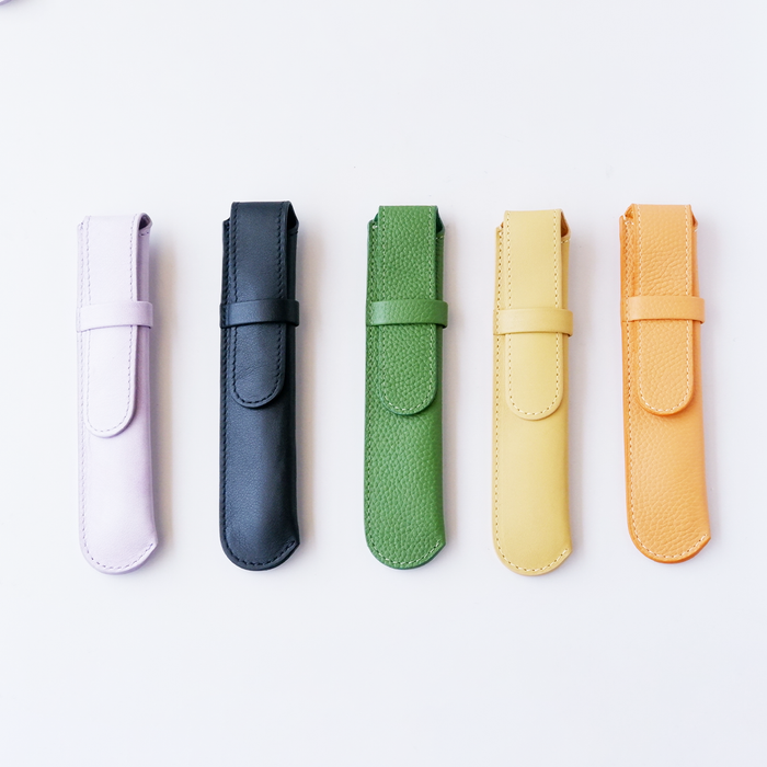 Orange leather pen case with a single slot from Eng Leather Co., showcasing smooth leather and compact design.