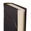 Dark leather photo album by Il Cartiglio featuring elegant stitched binding and archival-quality pages for cherished memories.