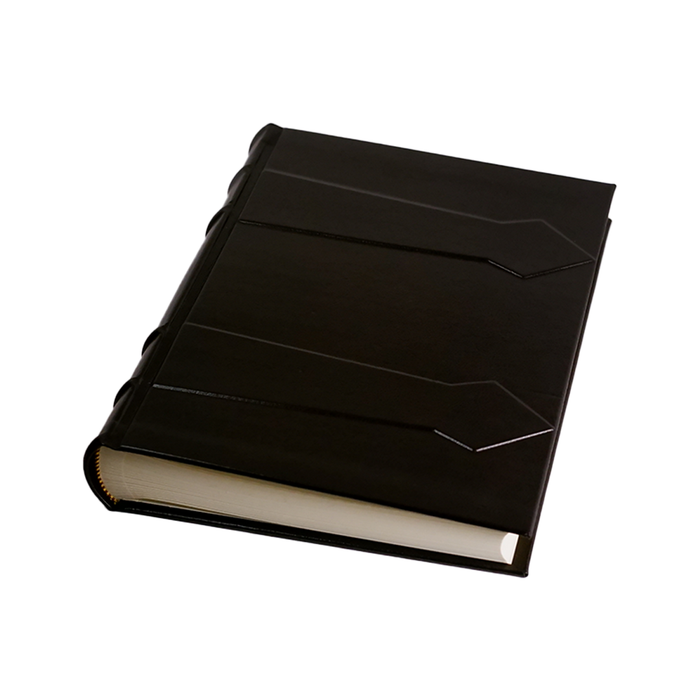 Dark leather photo album by Il Cartiglio with gold embossed details and a classic binding, ideal for storing cherished photographs.