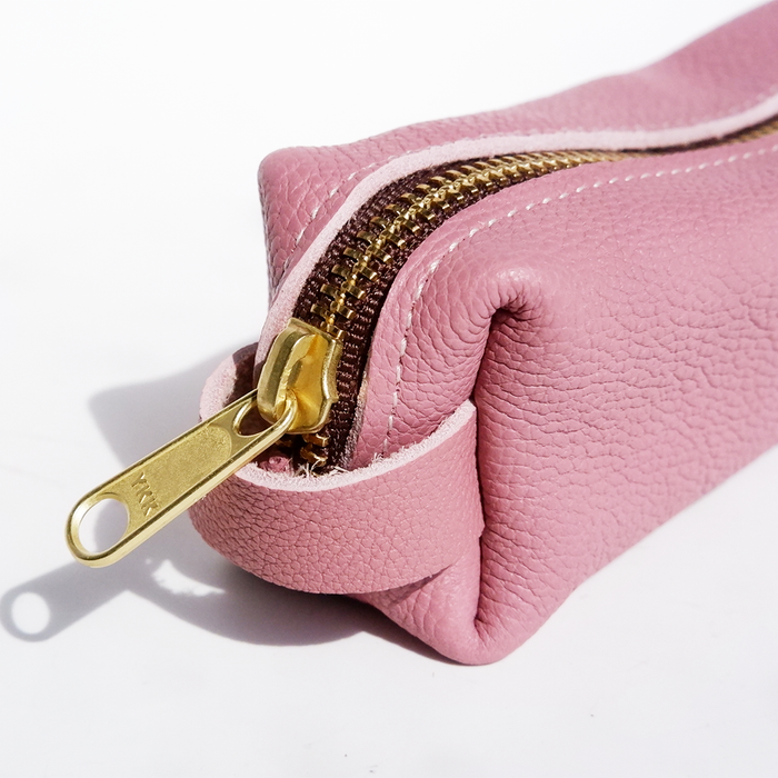 Pink San Lorenzo pen case with a smooth fabric exterior, designed to hold pens and small stationery items.