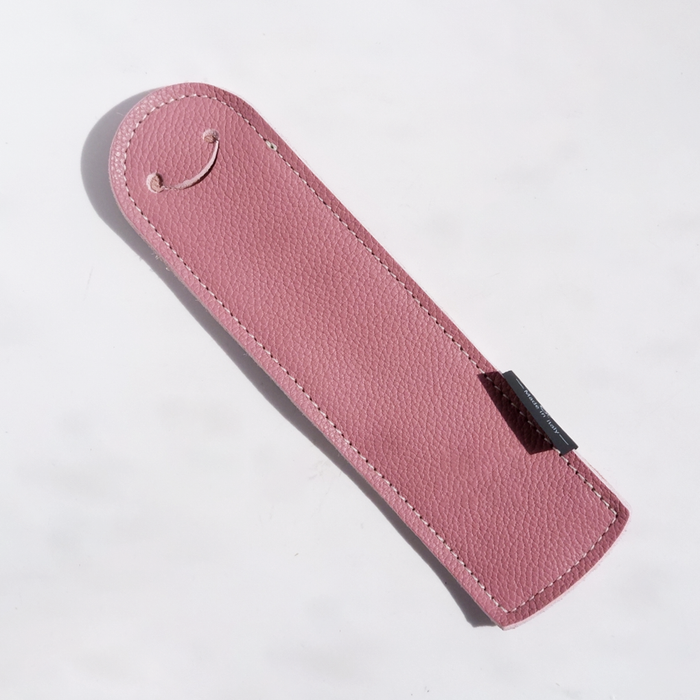 Pink San Lorenzo bookmark pen sleeve featuring a slim, decorative case with a built-in pen holder for easy book marking and note-taking.
