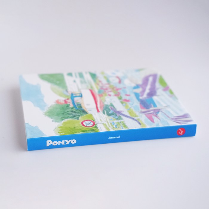 Chronicle Books Ponyo journal with colorful cover featuring Ponyo character, perfect for writing and note-taking.