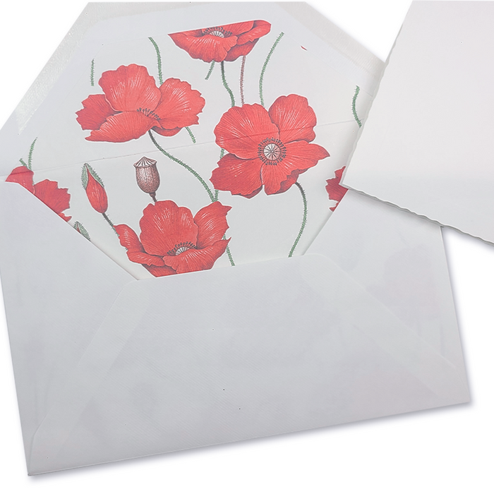 Rossi lined envelopes featuring a vibrant poppy flower design on white paper, ideal for elegant correspondence.