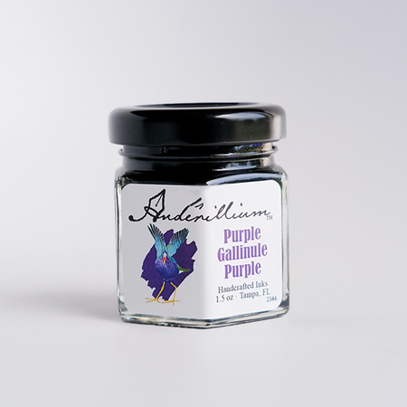 Anderillium Purple Gallinule Purple fountain pen ink bottle with vibrant purple ink in a glass container.