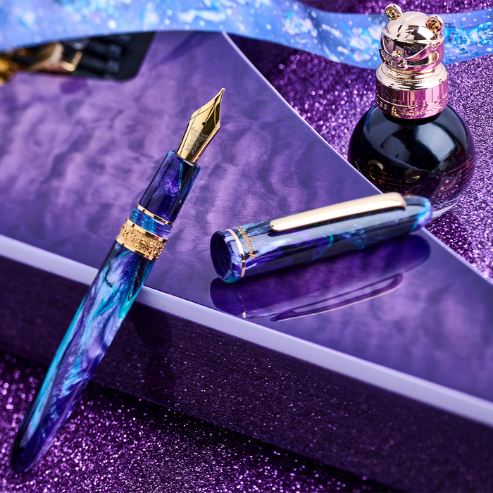 Esterbrook The Rockstar Estie fountain pen with a vibrant, artistic design and gold accents, showcasing its elegant craftsmanship.