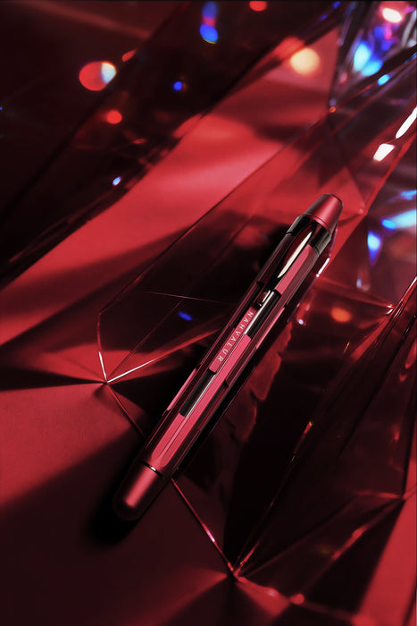 Nahvalur Eclipse fountain pen with emerald and ruby accents, showcasing its elegant design and vibrant gemstone details.