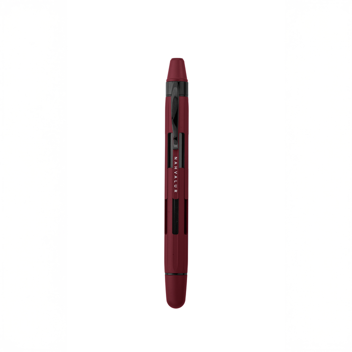 Nahvalur Eclipse fountain pen with emerald and ruby accents, featuring a sleek design and vibrant gemstone details.