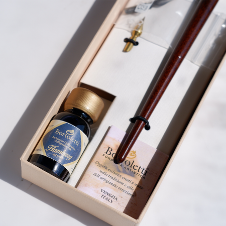 Bortoletti wood and brass dip calligraphy pen set with nibs and ink bottle for artistic writing and lettering.