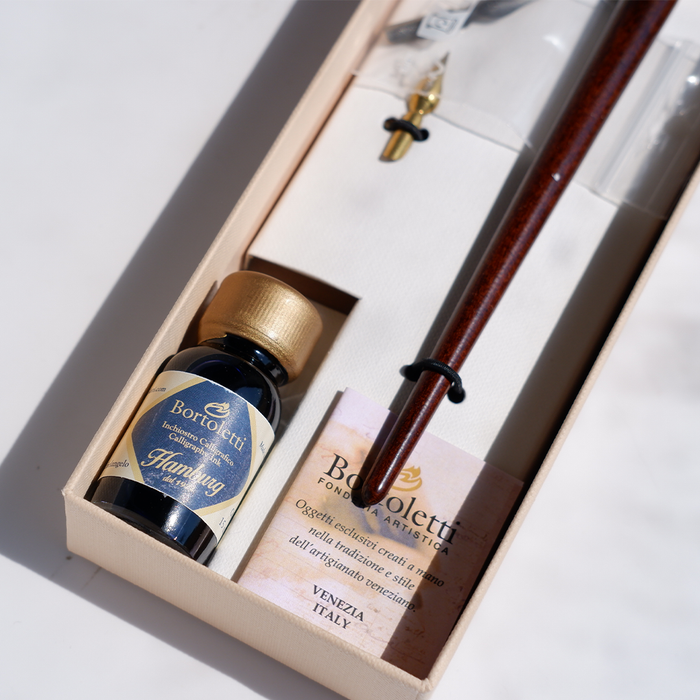 Bortoletti wood and brass dip calligraphy pen set with nibs and ink bottle for artistic writing and lettering.