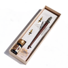 Bortoletti wood and bronze dip calligraphy pen set with nibs and ink bottle for artistic writing and calligraphy projects.