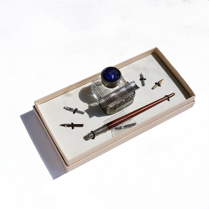 Bortoletti calligraphy pen set with various nibs and ink bottles for elegant handwriting and artistic lettering.