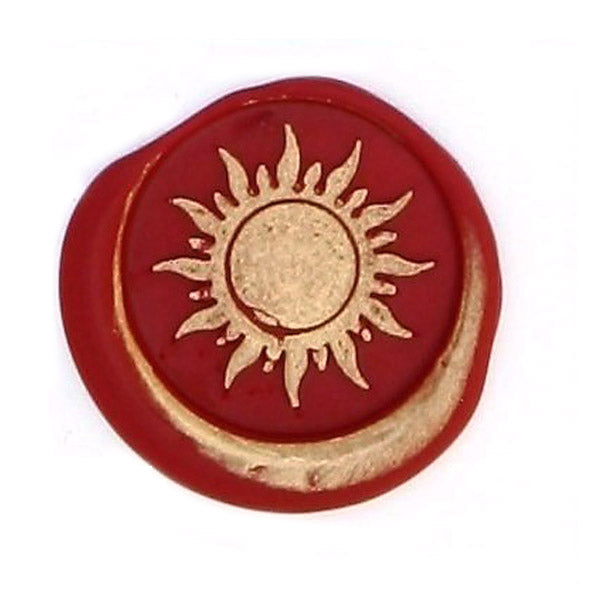 Bortoletti Symbol wax seal in gold with intricate design, used for sealing letters and documents.