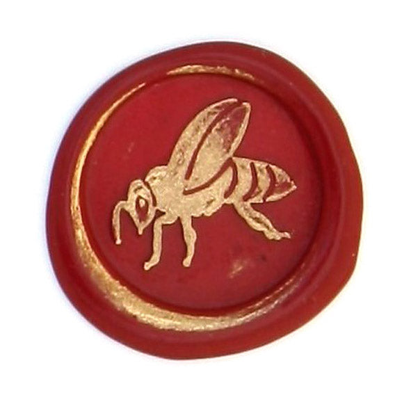 Bortoletti Symbol wax seal in a circular design, crafted from wax, used for sealing and decoration.