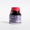 Papier Plume Southern Nights shimmer fountain pen ink bottle with dark blue and shimmering accents, ideal for elegant writing.