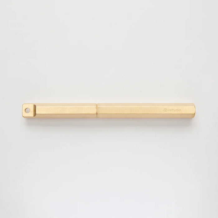 Y Studio Classic portable fountain pen with sleek design and silver finish, displayed on a white background.