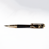 S.T. Dupont Line D Vitruvian Man limited edition fountain pen with detailed design and gold accents.