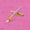 Esterbrook Sally Estie fountain pen with colorful comic-style background, featuring a sleek design and vibrant ink details.