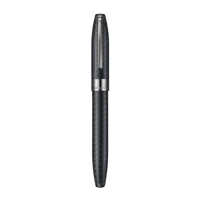 Sheaffer Legacy Chevron black matte fountain pen with gold accents, showcasing its sleek design and elegant craftsmanship.