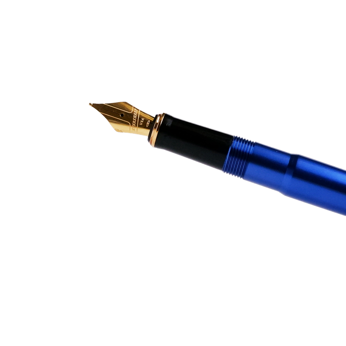 Wahl-Eversharp Skyline fountain pen with gold trim and blue barrel, showcasing elegant design and fine writing craftsmanship.