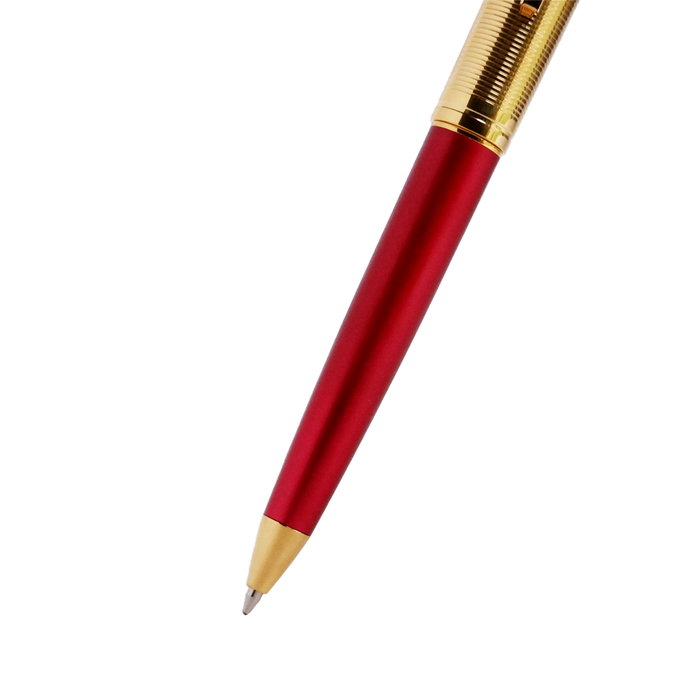 Wahl-Eversharp Skyline ballpoint pen with gold trim and red body, showcasing a sleek and elegant writing instrument.