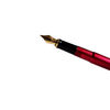 Wahl-Eversharp Skyline fountain pen with gold trim and red body, showcasing elegant vintage-style writing instrument.