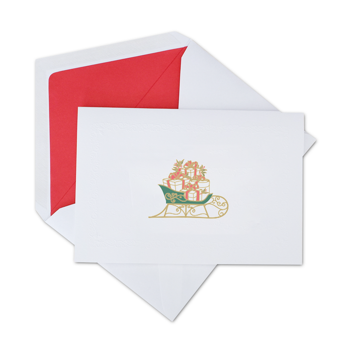 Rossi Christmas card featuring a festive sleigh design with holiday-themed imagery on a white background.