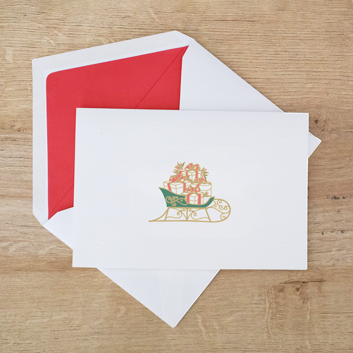 Rossi Christmas Card featuring a festive sleigh design with holiday-themed graphics and vibrant colors.